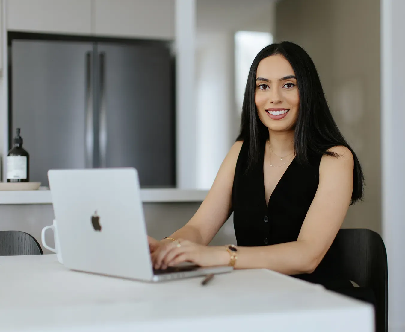 Refyne mortgage broker at a desk